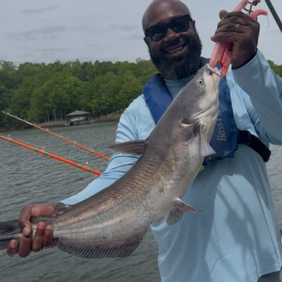 a man holding a fish