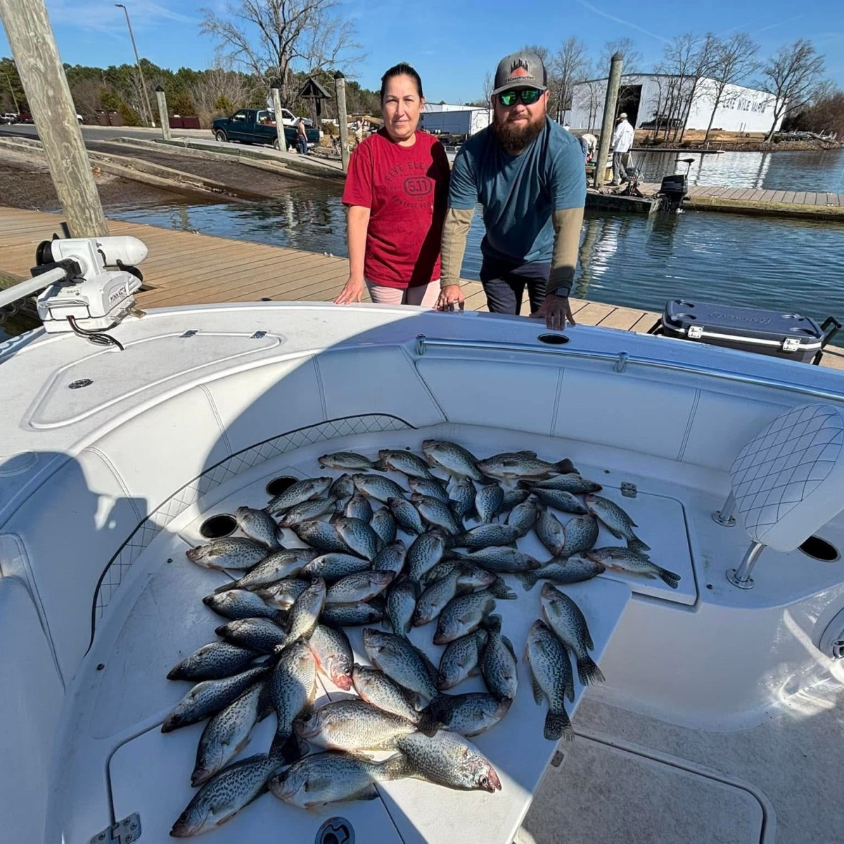 a group of people on a boat in the water