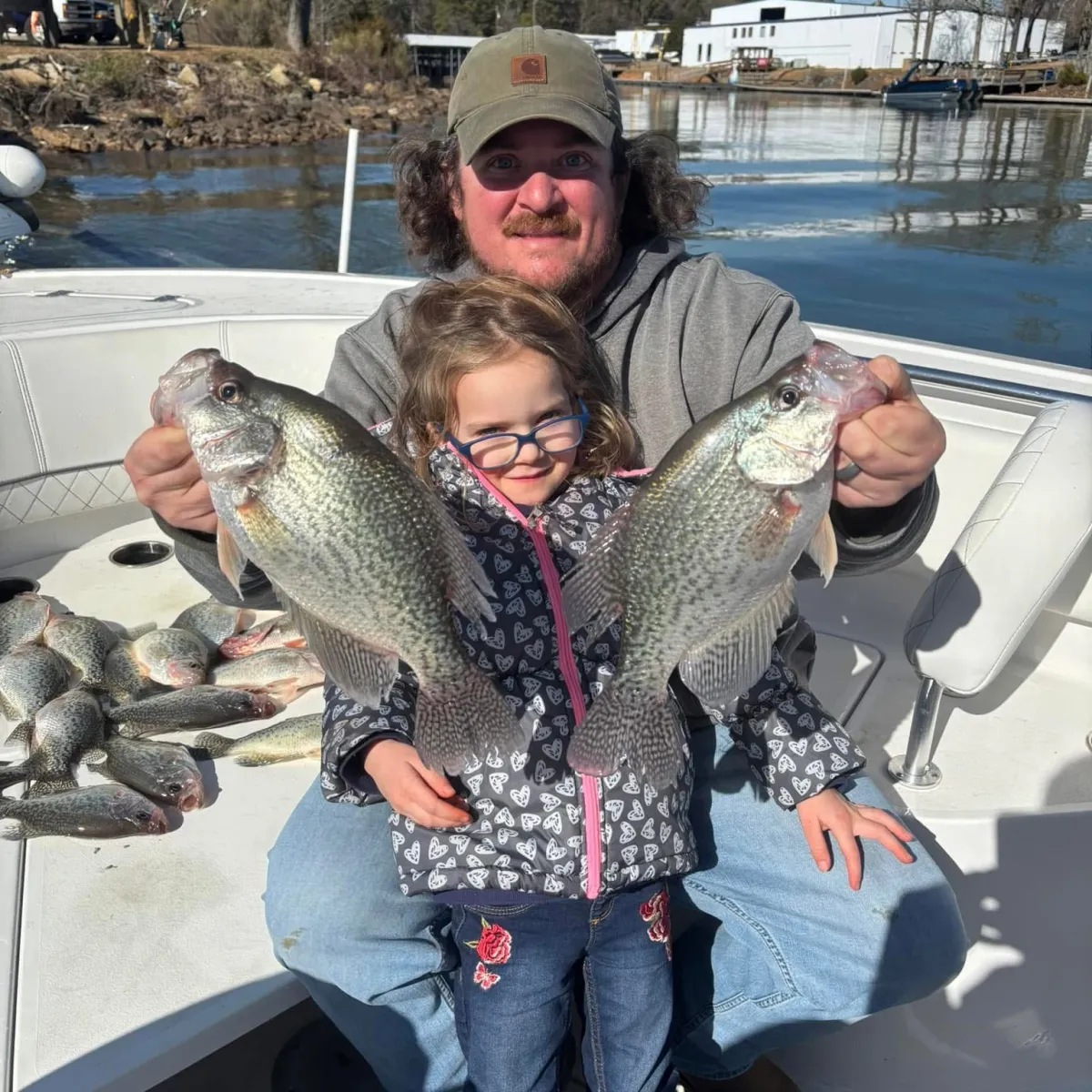 a person holding a fish